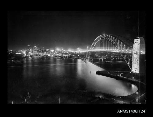 Negative depicting a night view of Sydney Harbour