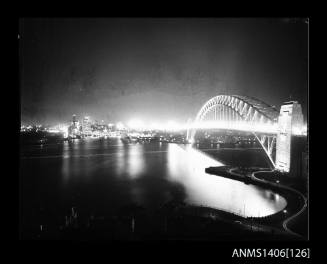 Negative depicting a night view of Sydney Harbour