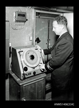 Negative depicting a crew member using equipment of the PRINCESS OF TASMANIA