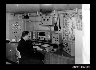 Negative depicting a crew member using equipment of the PRINCESS OF TASMANIA