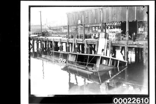 Sunk ship at moorings