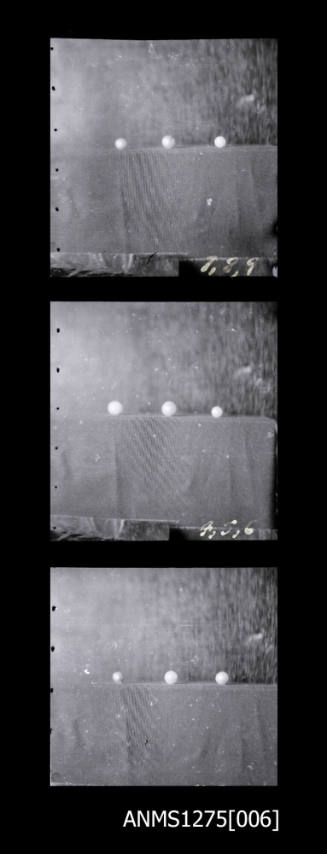 Three negatives, joined together, each of half pearl (or mabe pearls) in a row