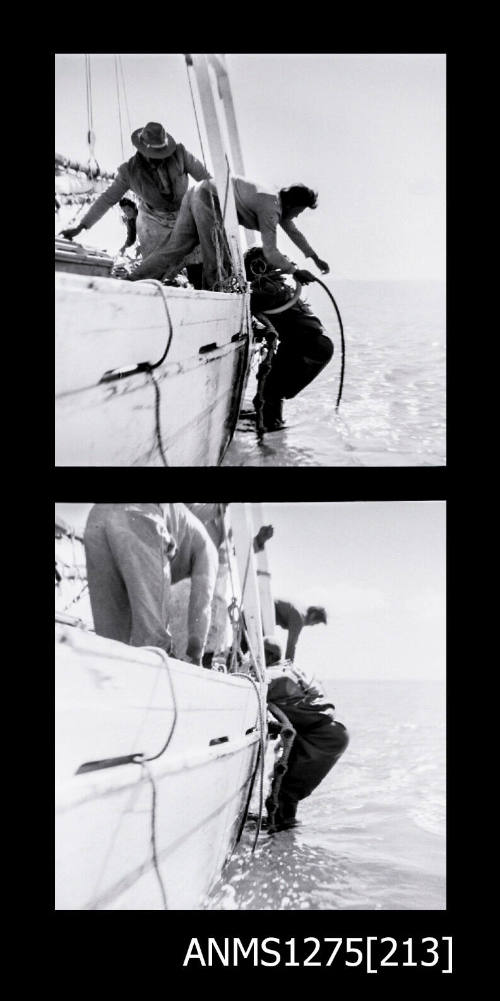 Two black-and-white negatives, joined together, both of a man wearing a diving suit and helmet being pulled by people out of the water and into a lugger