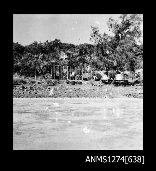 Building being constructed on the shoreline at Packe Island