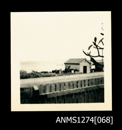 A shed on the waterfront, probably taken from the house in ANMS1274[052], on Packe Island