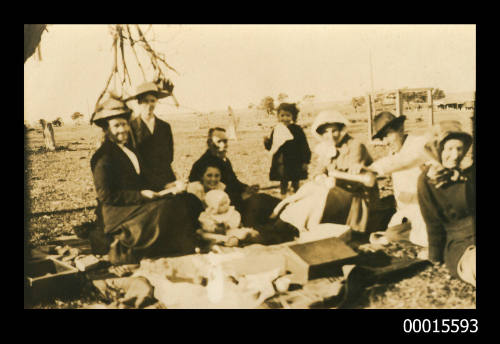 Group picnic under a tree