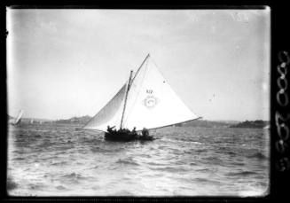 Portside view of LAH LOO under sail on Sydney Harbour