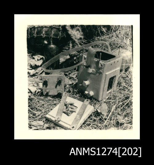 Pearling equipment, including wood and metal implements, and possibly an underwater camera, on Packe Island