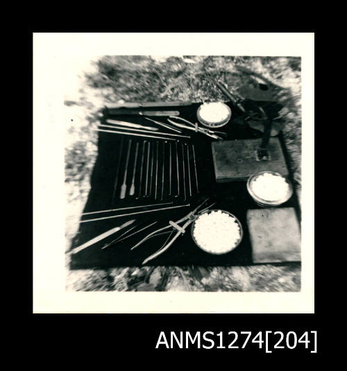 Pearling tools and equipments, laid out on a rug on Packe Island