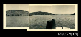 Water and land, taken from a boat, on Packe Island