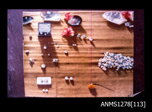 35mm colour transparency of pearls, pearl shells and jewellery displayed on a table