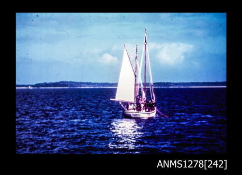 35mm colour transparency of a boat sailing in the water