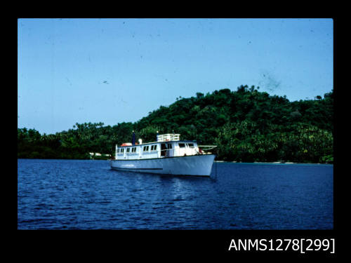 35mm colour transparency of a white boat in the water