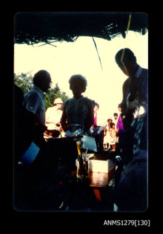 Queen Elizabeth II and Prince Philip with Denis George in shadow