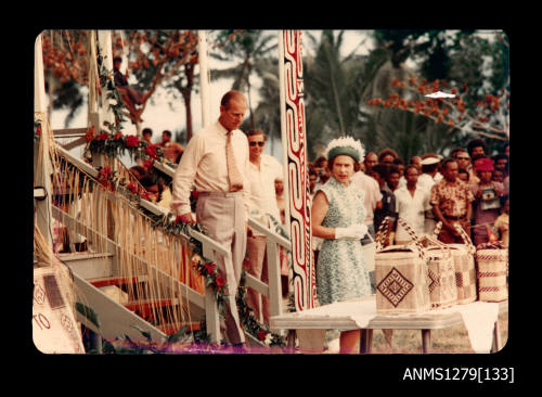 Queen Elizabeth II and Prince Philip near a basket display