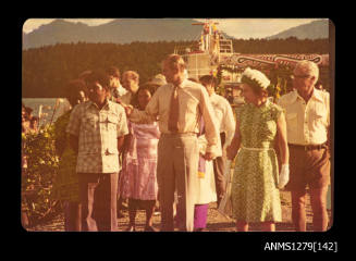 Queen Elizabeth II, Prince Philip, Denis George and others touring Milne Bay