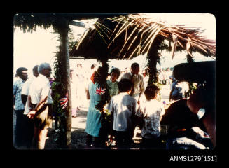 Queen Elizabeth II and Prince Philip inspecting pearling table at Milne Bay