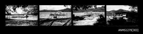 Strip of four black-and-white negatives, the first is a shed, and the next three of a pearl production raft over the water