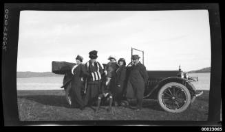 Group portrait by a car, including Captain Edward Robert Sterling