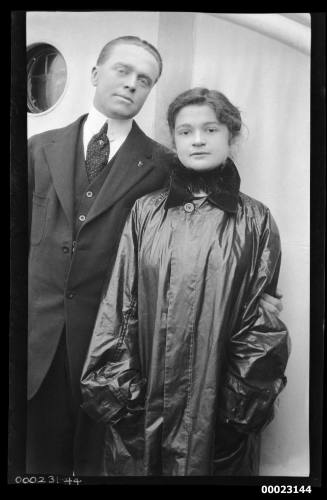 Ray Milton Sterling standing with an unidentified woman