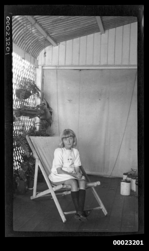 Girl on deck chair