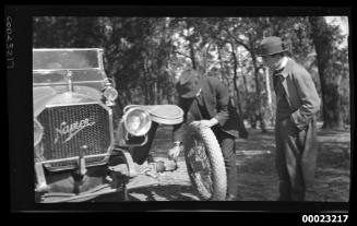 Man changing a car tyre