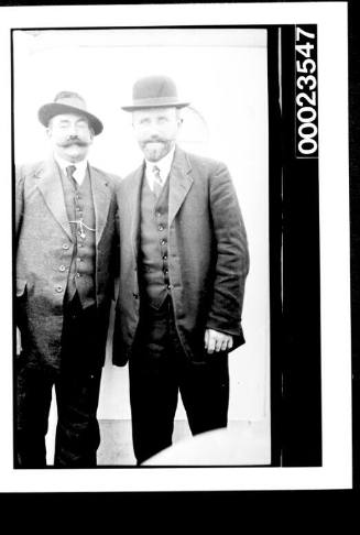 Ships and steamer crews, two men in suits