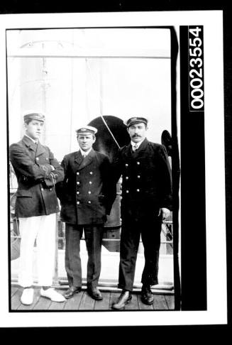 Ships and steamer crews, three men standing in uniform