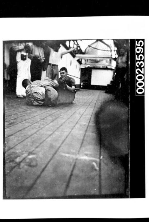 Ships and steamer crews, two men on deck