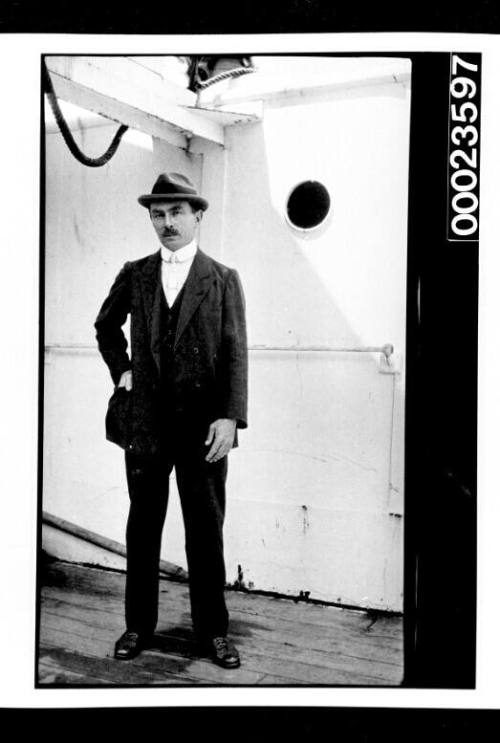 Ships and steamer crews, man in three piece suit