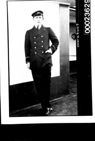 Ships and steamer crews, man standing in uniform