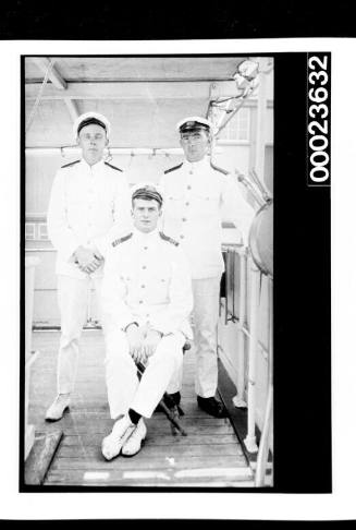 Ships and steamer crews, three men in white uniforms