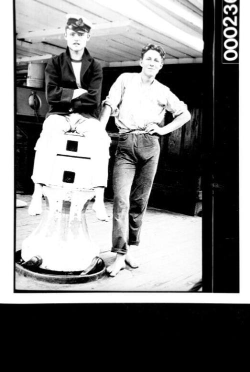 Ships and steamer crews, two men on deck in casual clothing and no shoes