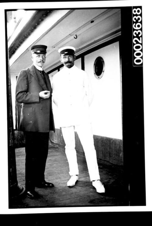 Ships and steamer crews, two men standing