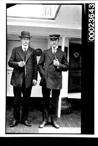 Ships and steamer crews, two men in black suits 