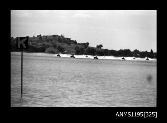 Lake Glenmaggie 1971, seven outboard catamarans lined up