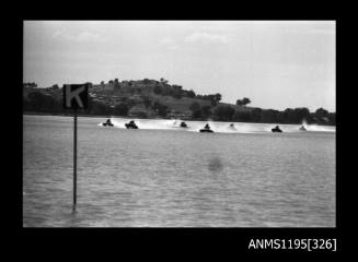 Lake Glenmaggie 1971, seven outboard catamarans lined up