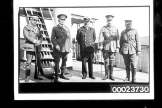 Five men in uniform