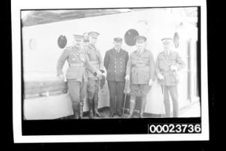 Five men in uniform