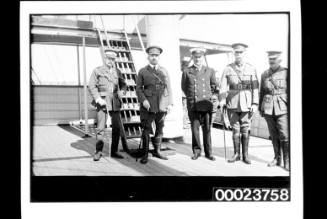 Five men in uniform