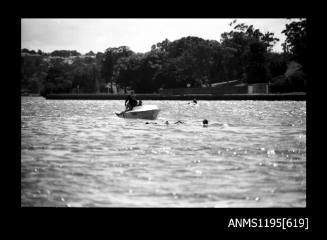 Hen and Chicken Bay 1970s, inboard runabout on standby