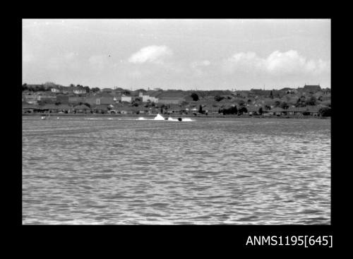 Hen and Chicken Bay 1970s, two unidentified runabouts