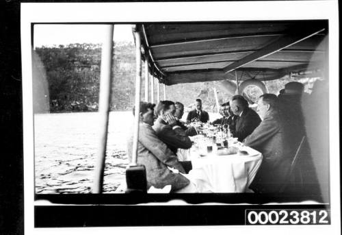 Men seated at dining table