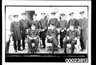 Two rows of officers on deck