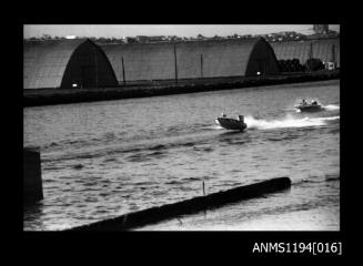 Silverwater 1970s, outboard runabout LITTLE DELINQUENT and an unidentified outboard powerboat