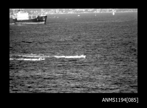 Offshore powerboat racing 1970s, two unidentified powerboats