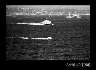 Offshore powerboat racing 1970s, unidentified outboard runabout and a Manly hydrofoil ferry