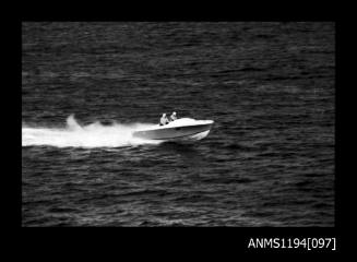 Offshore powerboat racing 1970s, unidentified inboard powerboat