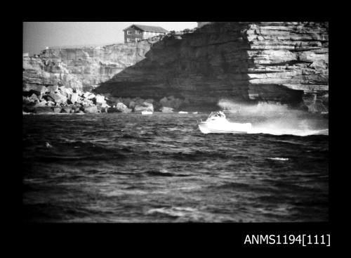 Offshore powerboat racing 1970s, unidentified half cabin outboard runabout