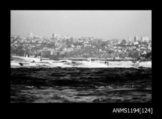 Offshore powerboat racing 1970s, race contestants heading out to sea